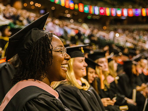 MPH students wearing caps and gowns at commencement ceremony