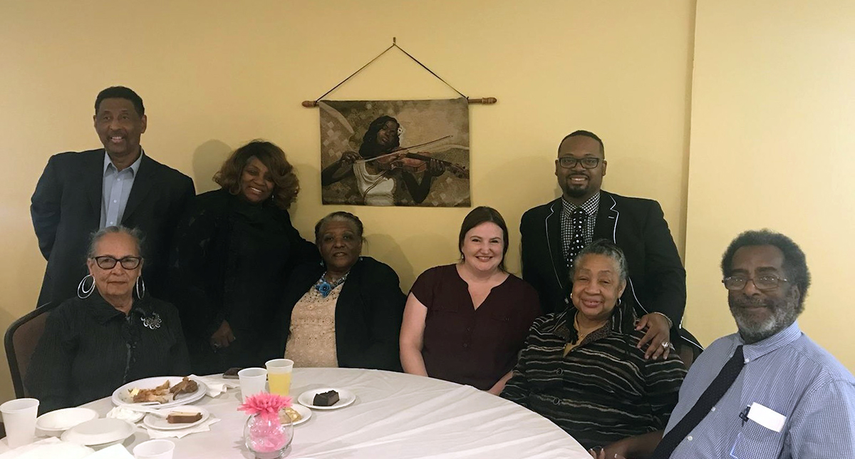Community partners people at a dinning table