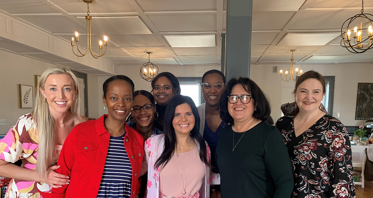 Image of two ladies smiling Jennifer Johnson and Team