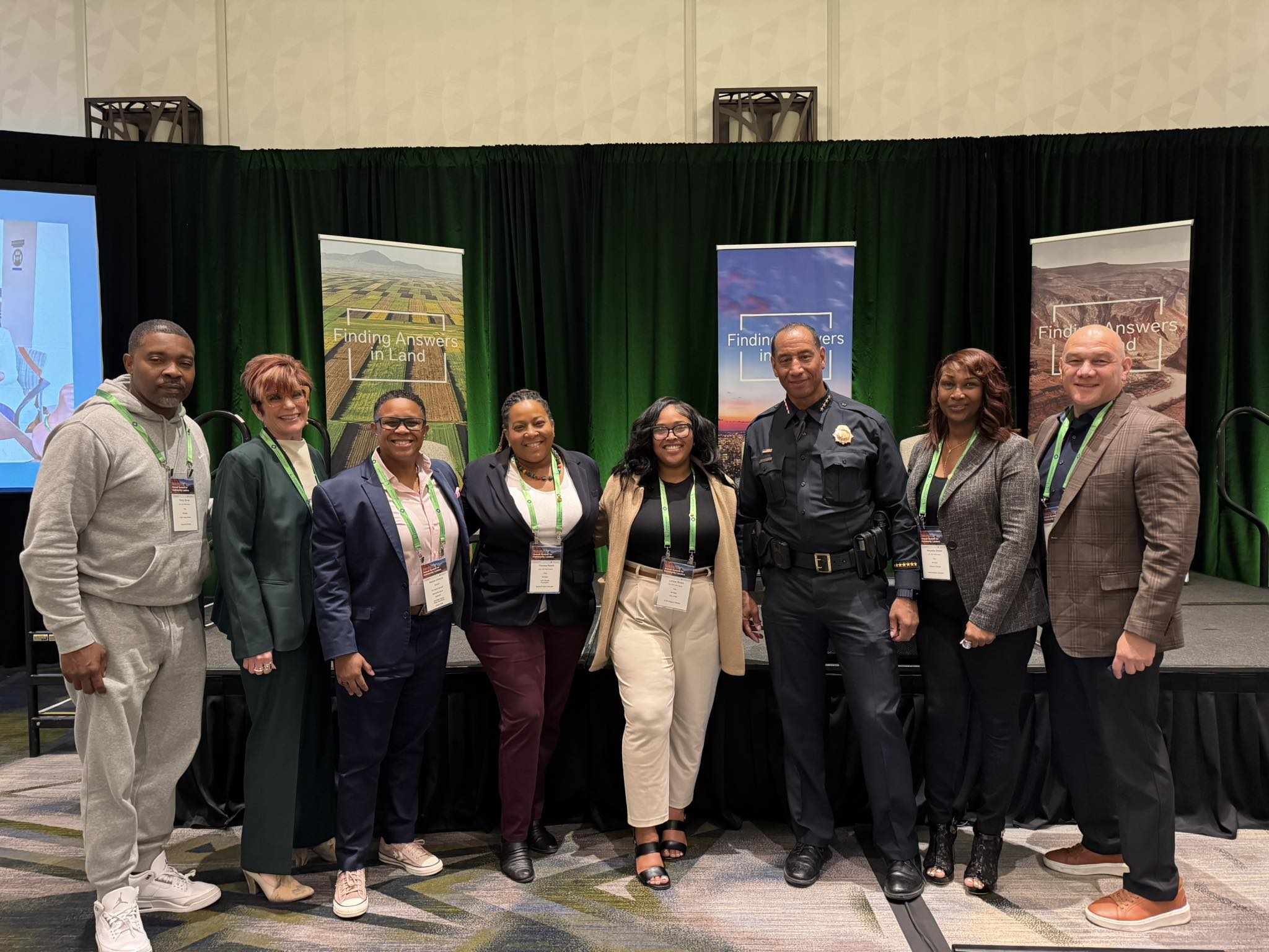 Latrese carruth standing with several other people