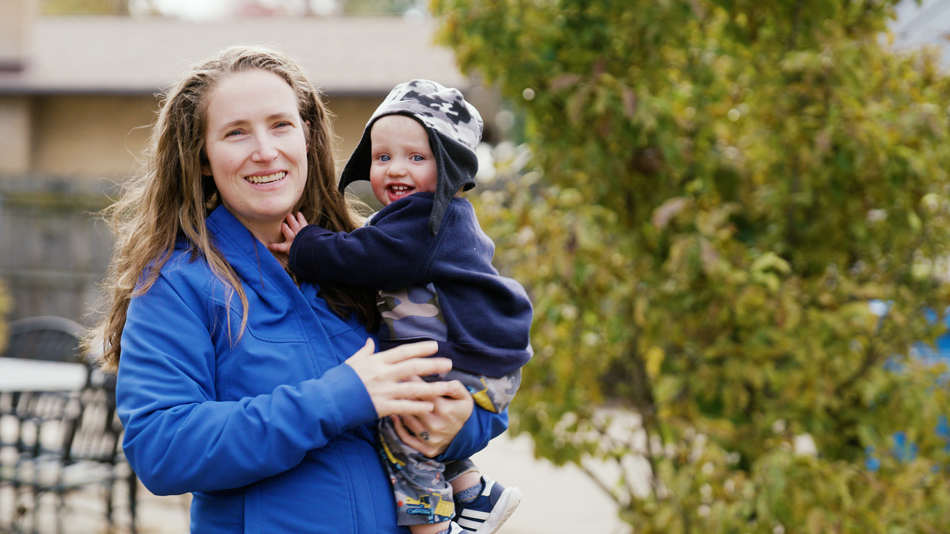 woman holding her baby